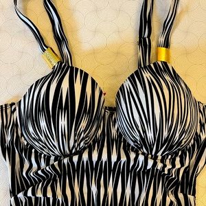 Spanx one piece swim suit with tummy control. Size 12